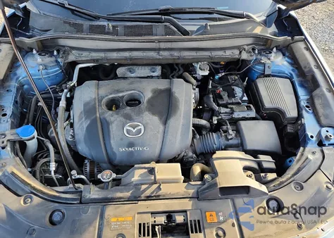 2021 Mazda Cx-5 Sport z USA, uszkodzony, nr VIN JM3KFBBM8M0310400